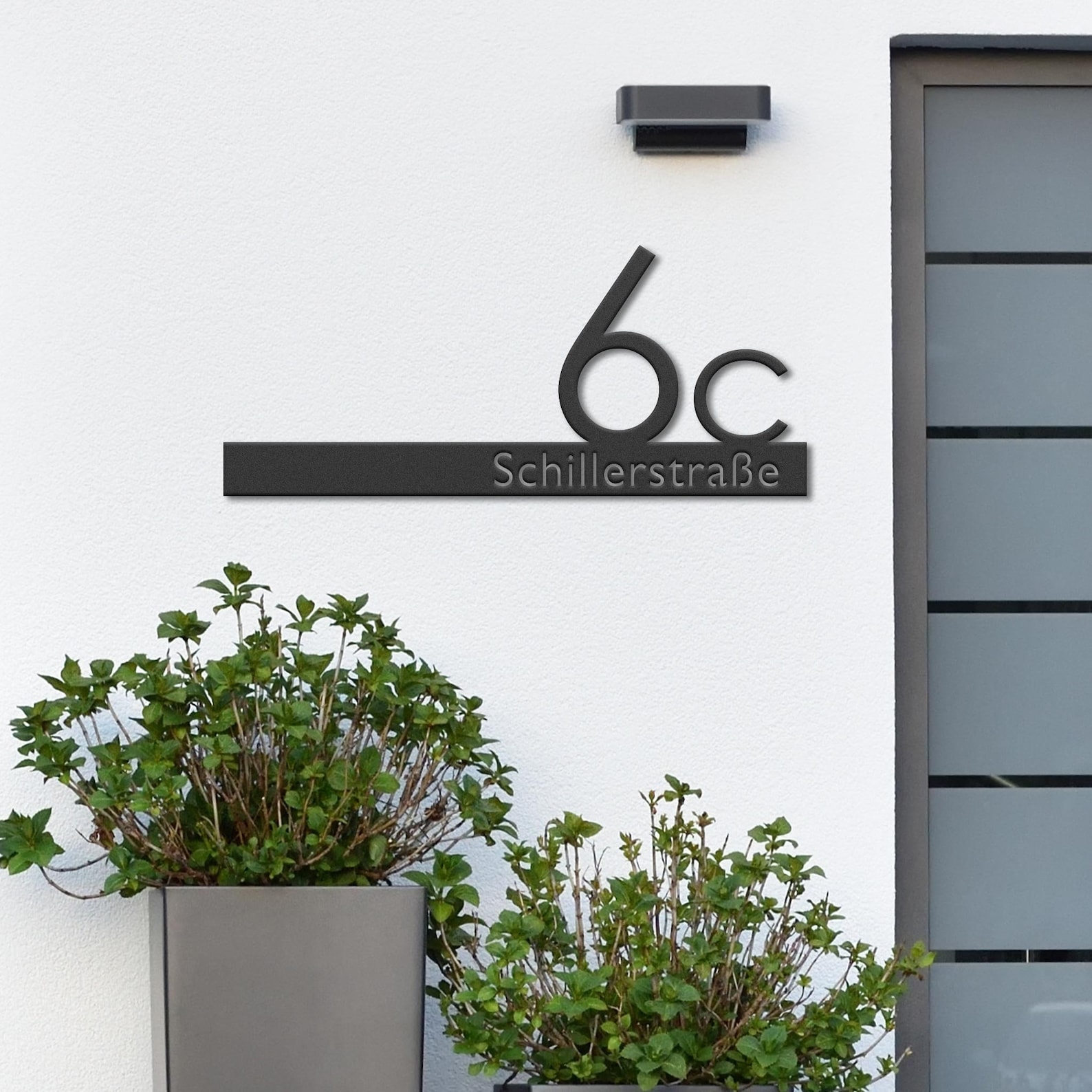 Building identification marker for unit 6C in powder coated aluminum.