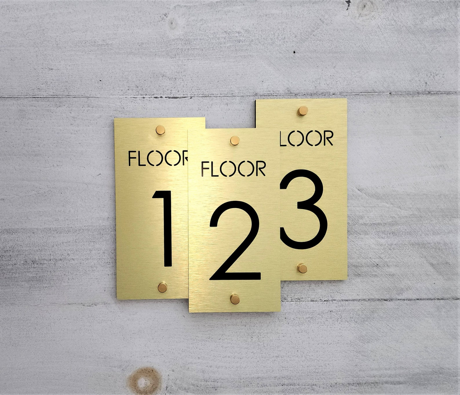 Floor-level panels for elevator thresholds.
